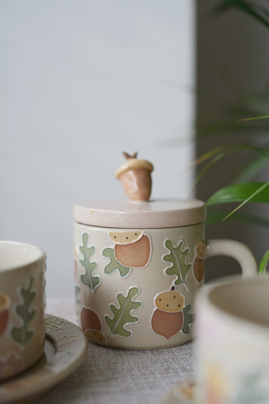 Mug à couvercle en forme de gland